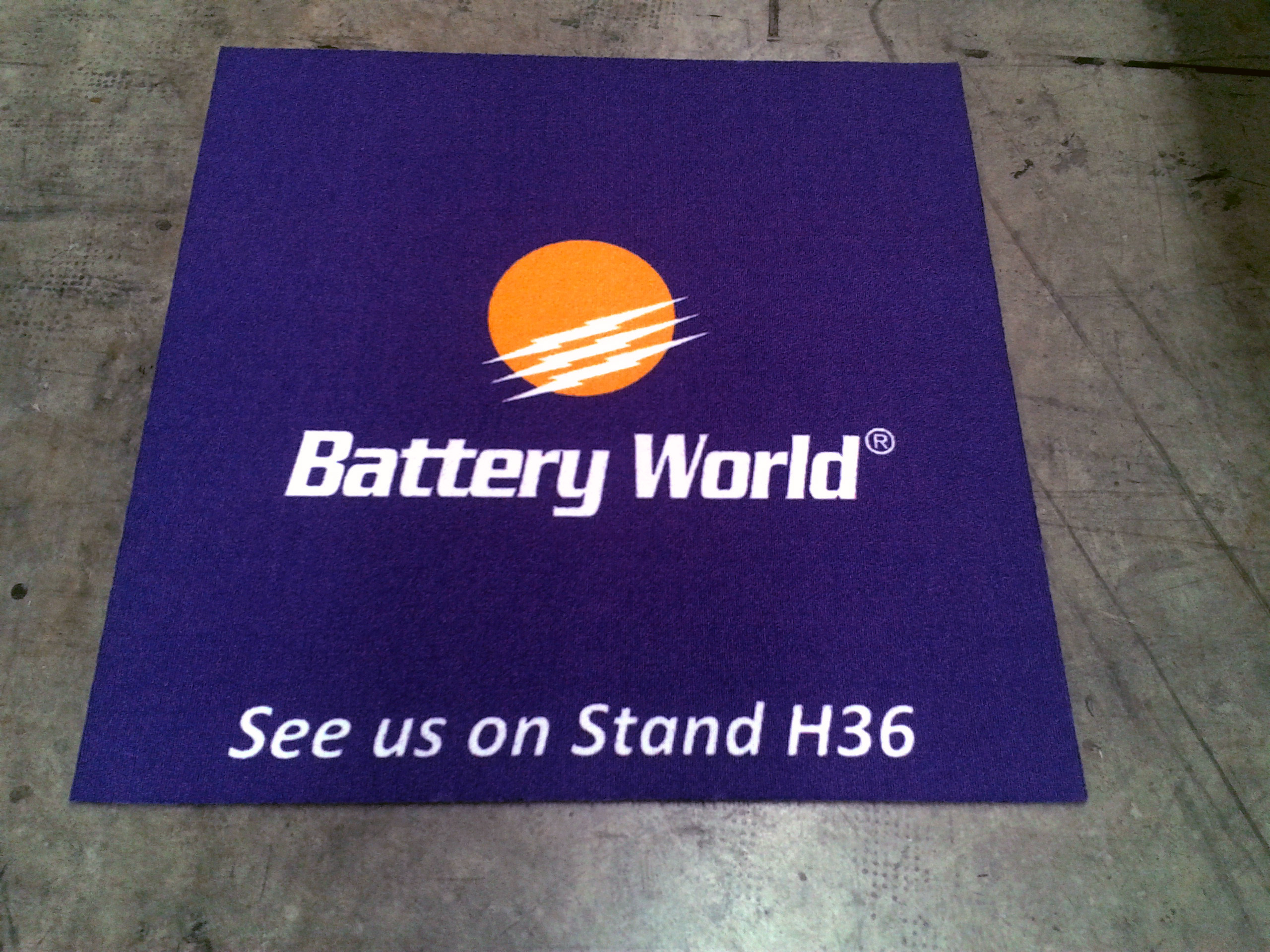 Battery World branded exhibition tile